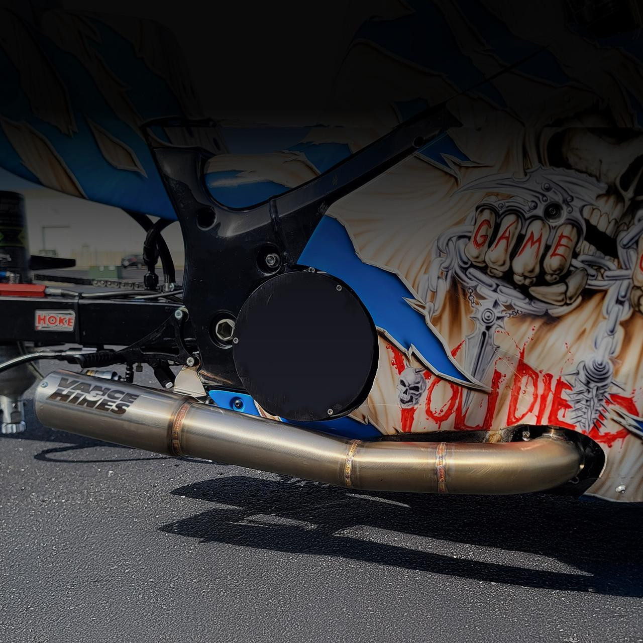 Vance & Hines 4-1 Exhaust System Suzuki Hayabusa (99-25), motorcycle exhaust system installed on a bike with colorful body art.