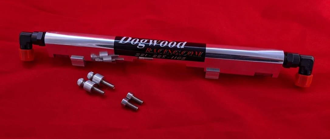 Dogwood Racing Fuel Rail Kawasaki ZX-14 (06-25), modern motorcycle fuel rail with mounting hardware on red background.
