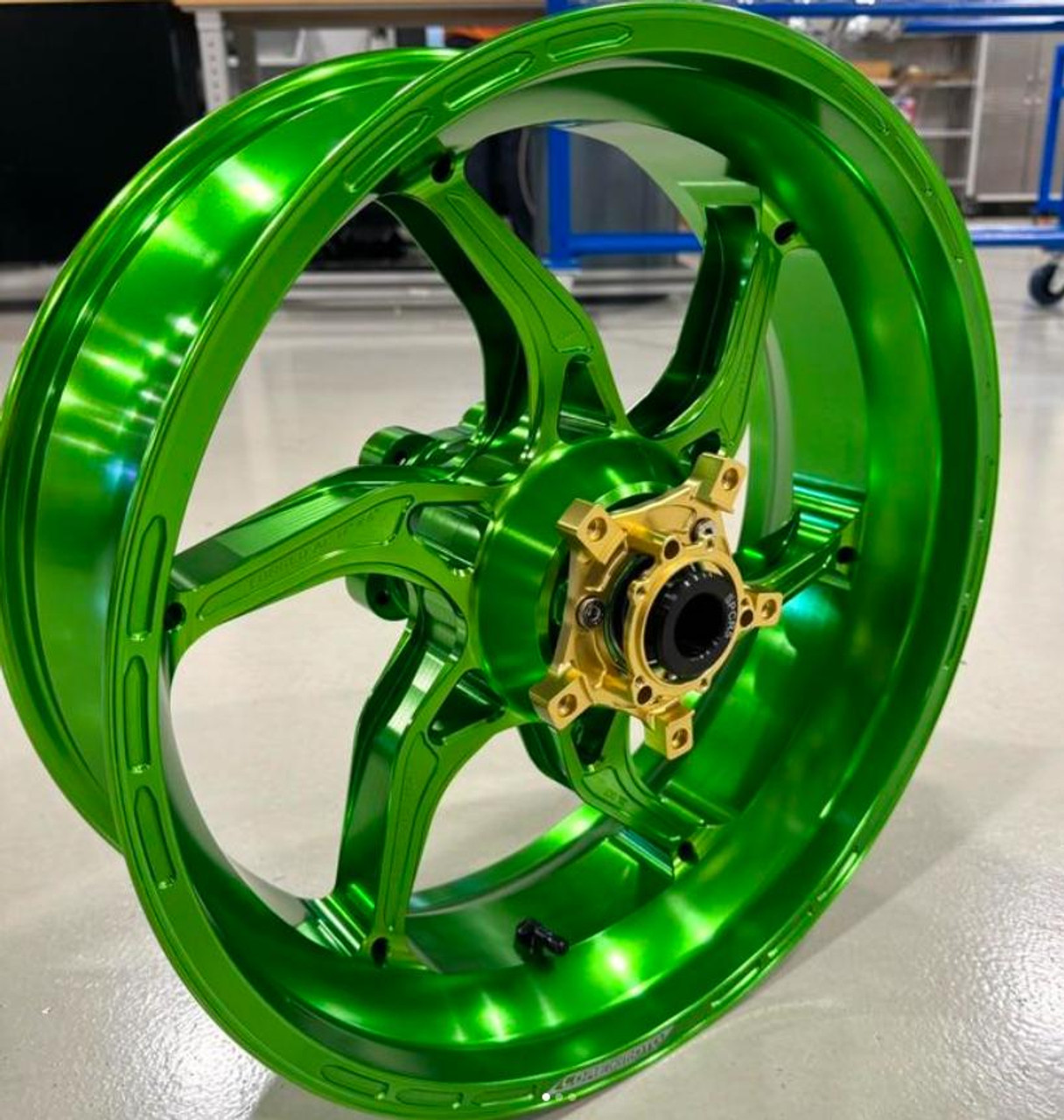 Coremoto Apex-6 Forged Aluminum Wheels Yamaha YZF-R6 17-24, vibrant green lightweight motorcycle wheel with a gold-colored hub, designed for high-performance Yamaha YZF-R6 (2017-2024) models.