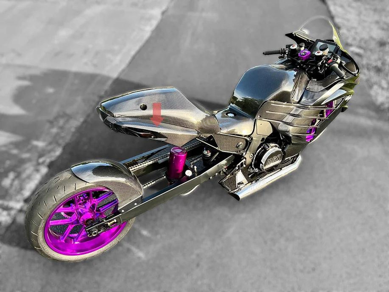 AGM Carbon Fiber Rear Tail Sides Kawasaki ZX-14R (06-26), motorcycle with carbon fiber body parts and purple wheels.