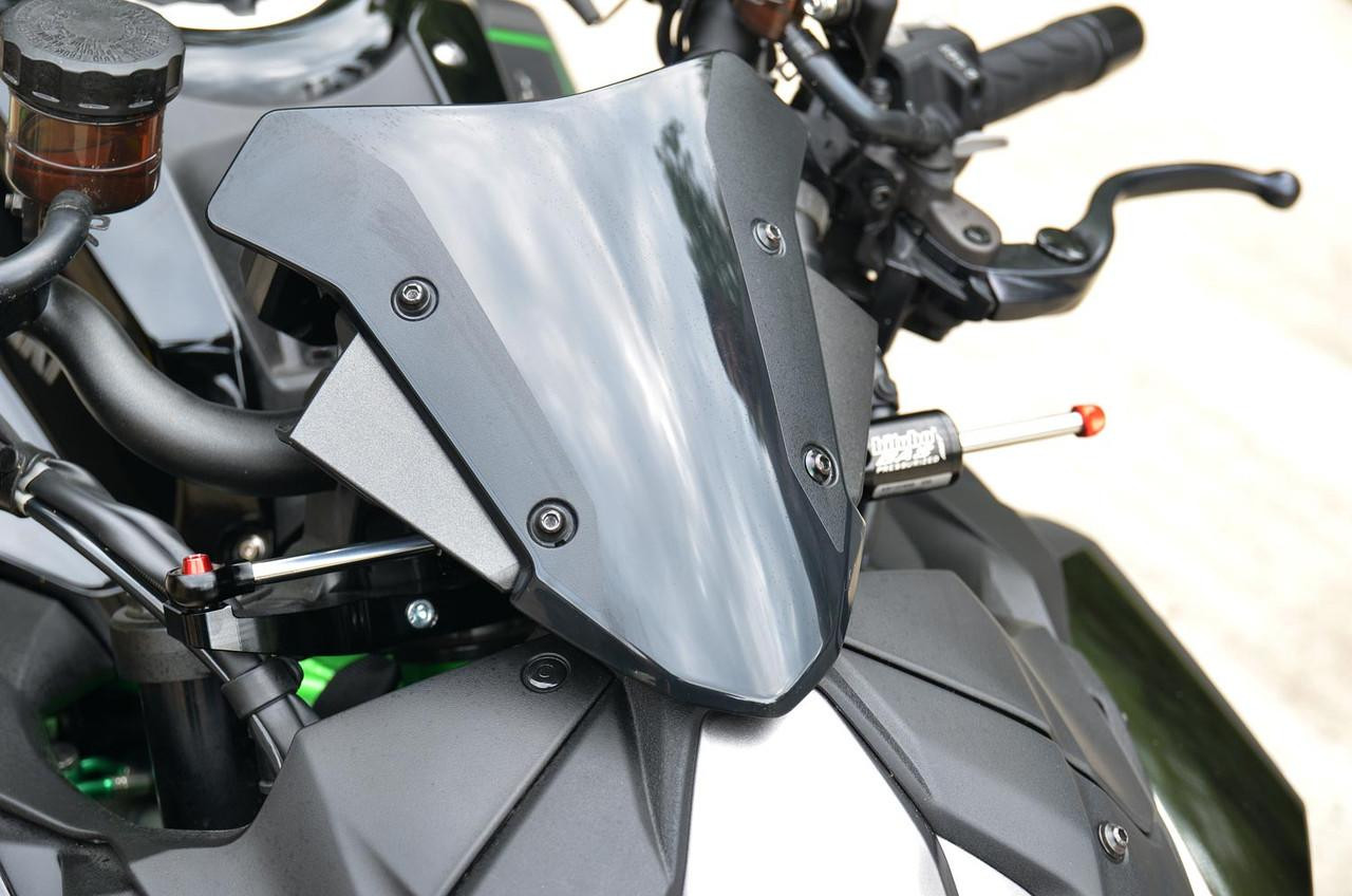 Brocks Performance Brocks Bitubo Steering Damper Kit Kawasaki Z H2 (20-25), close-up of motorcycle handlebar with the steering damper installed on a Kawasaki Z H2 model.