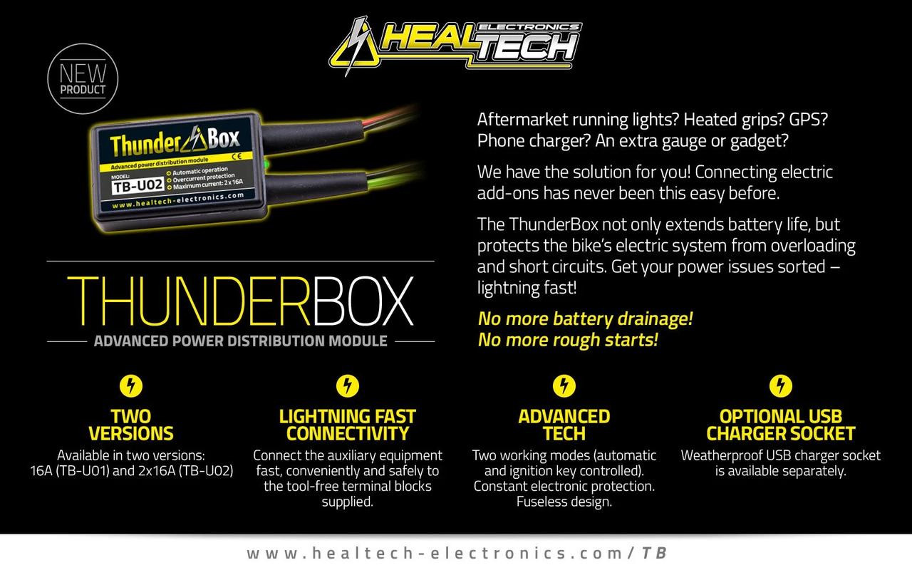 Healtech Thunderbox Power Distribution Module, black rectangular device with yellow label and cables, designed for motorcycle electrical system protection and power management.