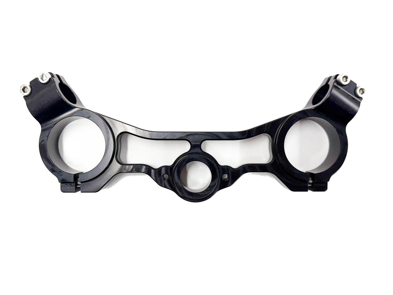 G Force G-Force Top Triple Clamp Kit Suzuki GSXR1000 (17-25), black aluminum motorcycle steering triple clamp with bolt holes for handlebar mounting and centralized hole for steering stem, against a white background.