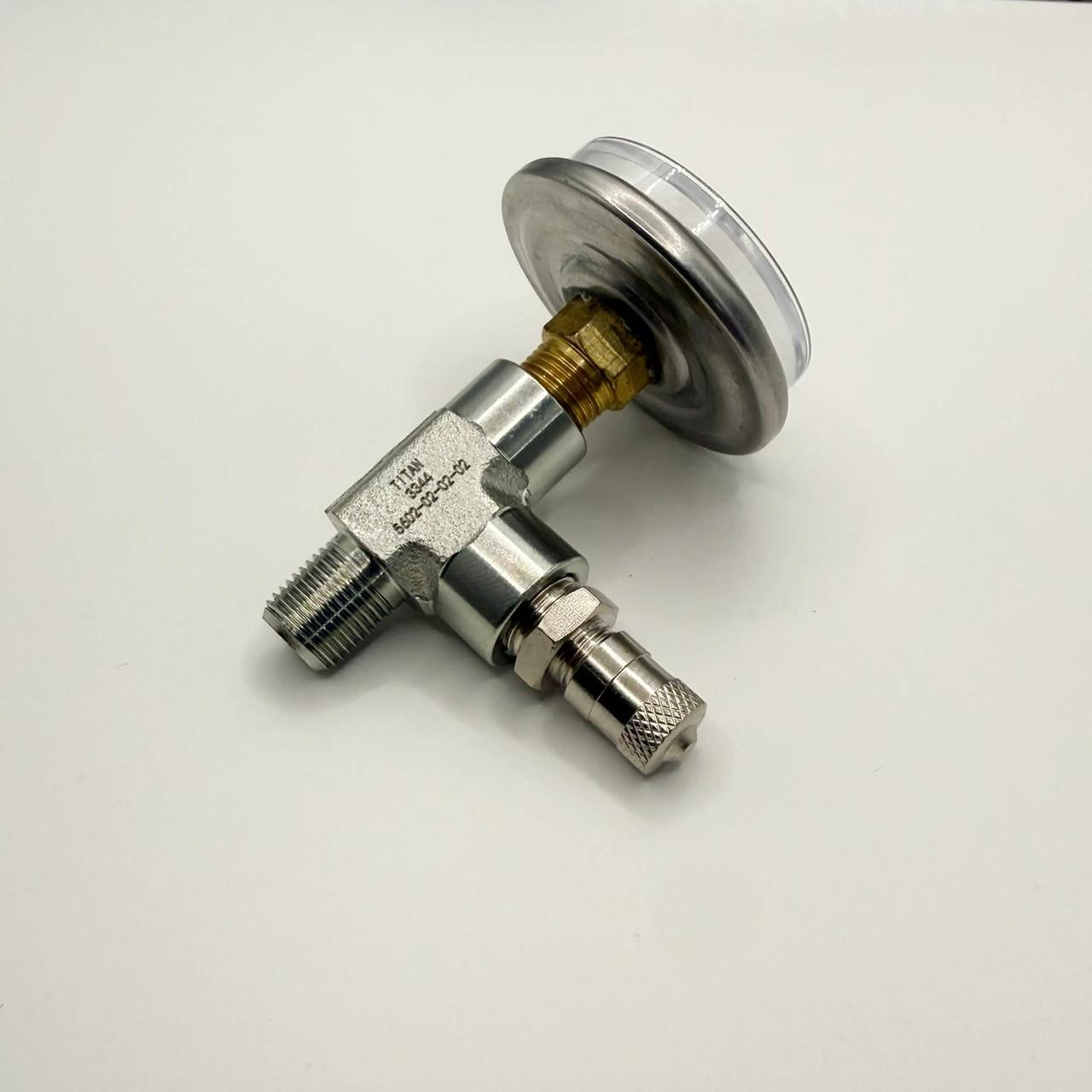 Schnitz Racing Motorcycle Performance Parts Schnitz Racing Compact T Adaptor, metallic T-shaped motorcycle part with a clear plastic top and threaded connections.