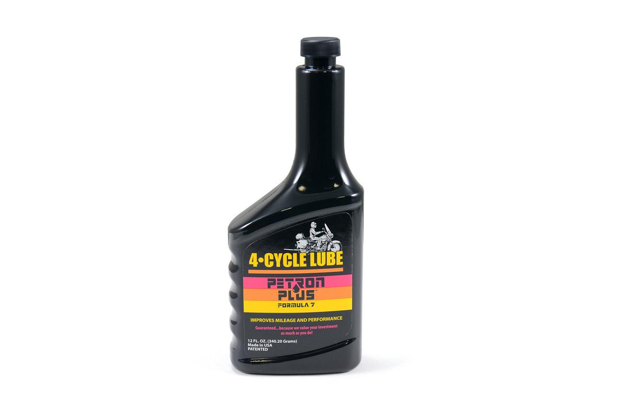Petron Oil Additive 4-Cycle Lube, black bottle with colorful label and screw cap.