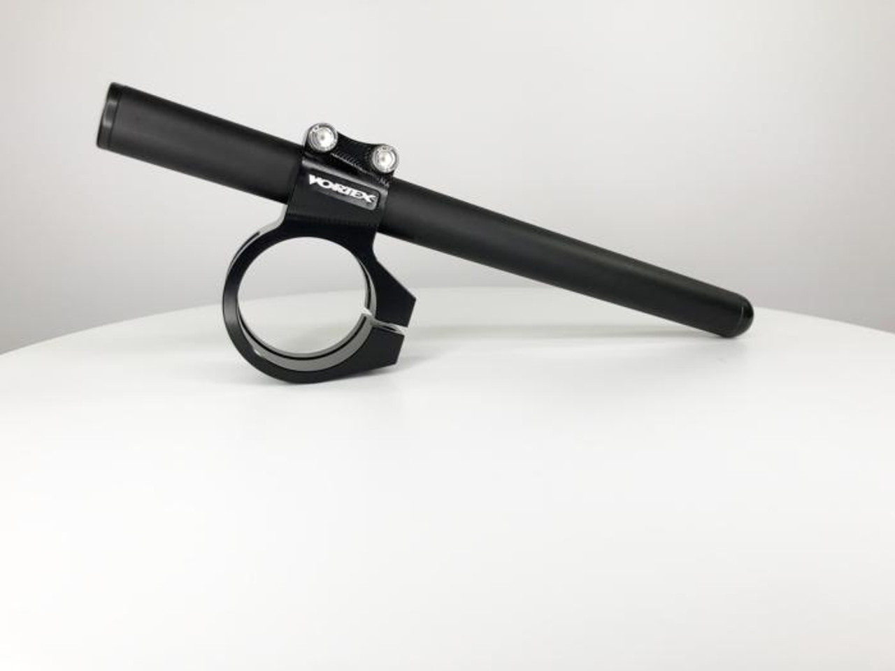 Vortex Clip-On Handlebars (7 Degree), black clip-on handlebars with mounting clamp for cycling bikes. Vortex Clip-On Handlebars (7 Degree), black clip-on handlebars with mounting clamp for cycling bikes.