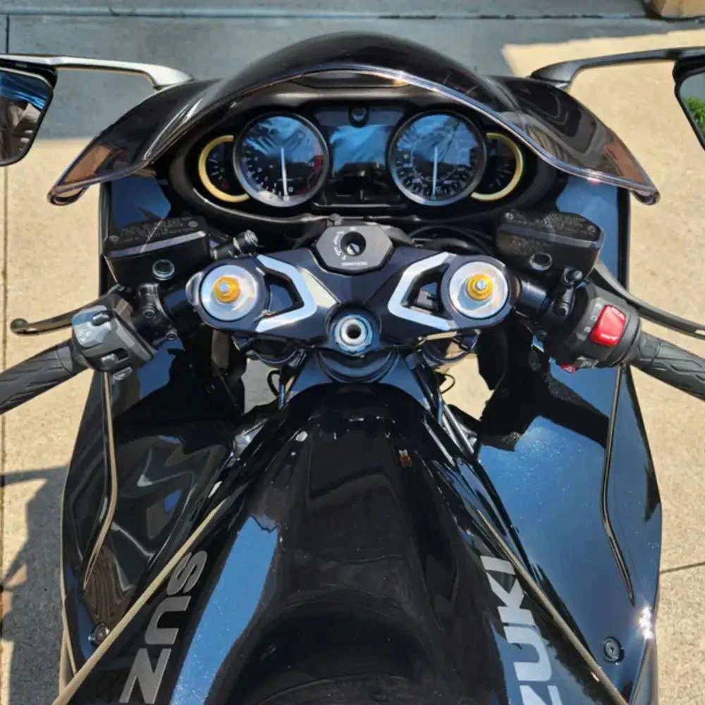 VooDoo Top Triple Tree Suzuki Hayabusa (22-26), close-up view of motorcycle handlebar and dashboard from a top perspective.