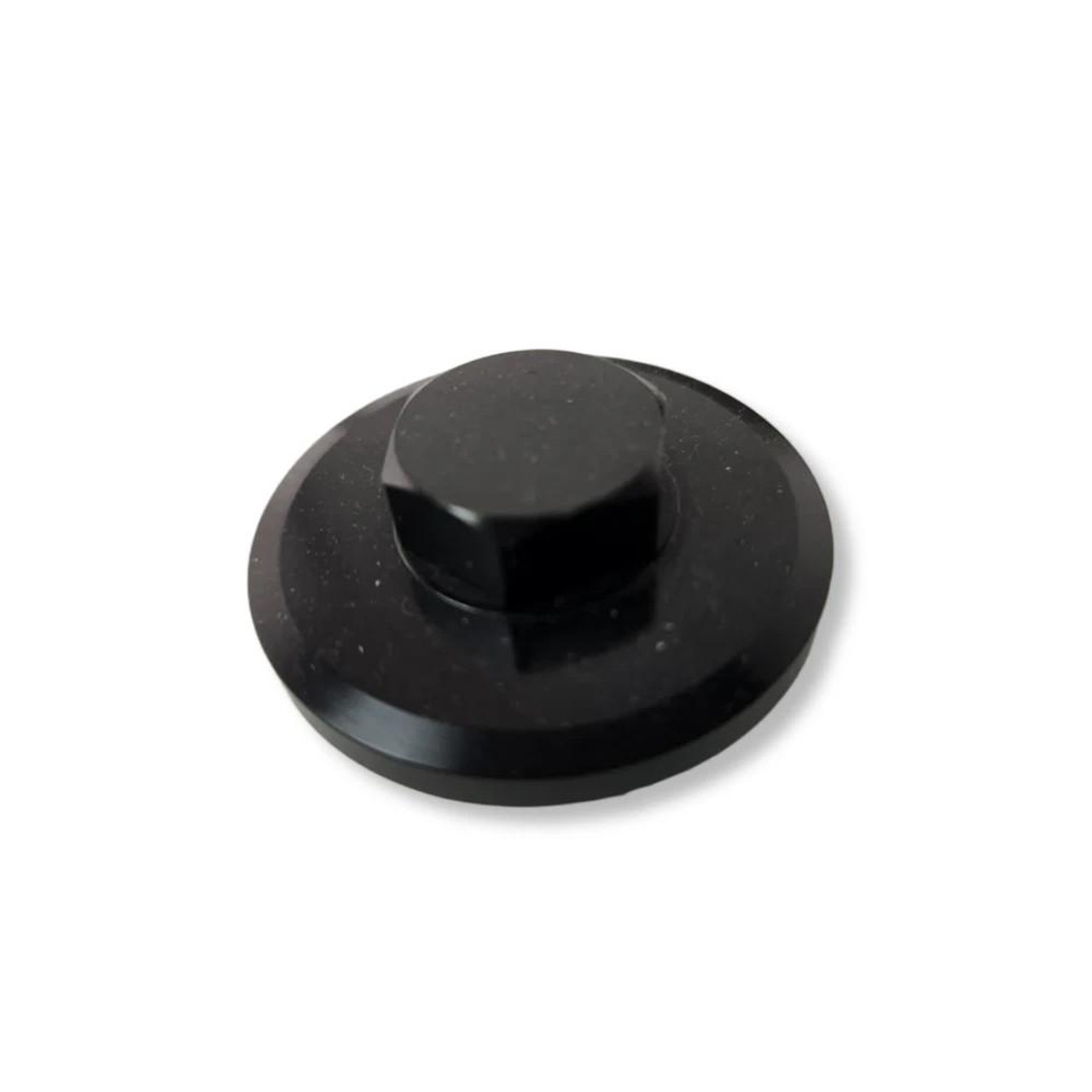 VooDoo Crankshaft Inspection Plug Suzuki Hayabusa (99–26), GSXR1000 (01–25), GSXR750 (00–25), GSXR600 (01–25), close-up view of a black round inspection plug with a hexagonal head for motorcycle crankshaft inspection. VooDoo Crankshaft Inspection Plug Suzuki Hayabusa (99–26), GSXR1000 (01–25), GSXR750 (00–25), GSXR600 (01–25), close-up view of a black round inspection plug with a hexagonal head for motorcycle crankshaft inspection.