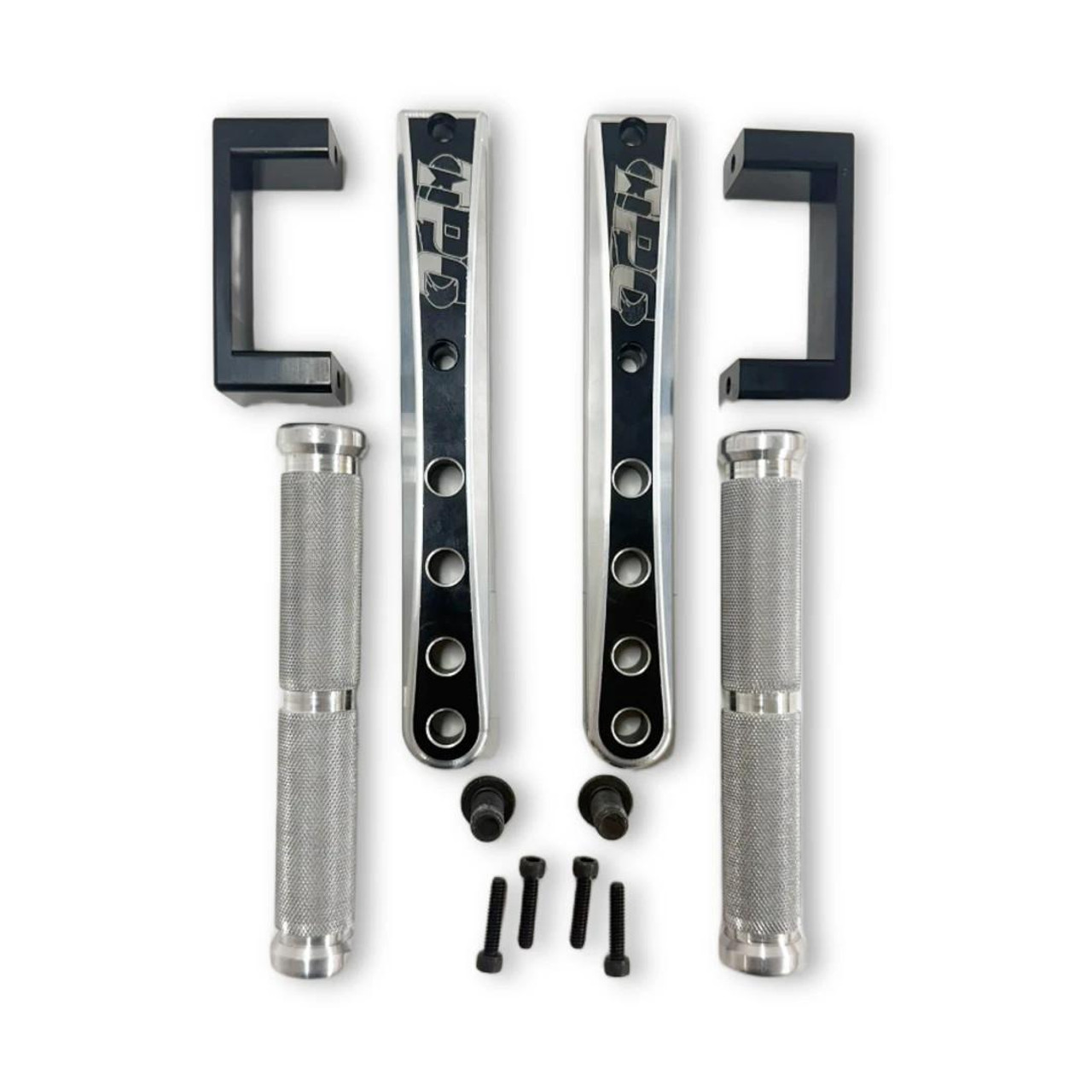 Total Performance Cycle TPC Swingarm Footpegs, motorcycle footpegs with metal grips, black brackets, and mounting hardware. Total Performance Cycle TPC Swingarm Footpegs, motorcycle footpegs with metal grips, black brackets, and mounting hardware.