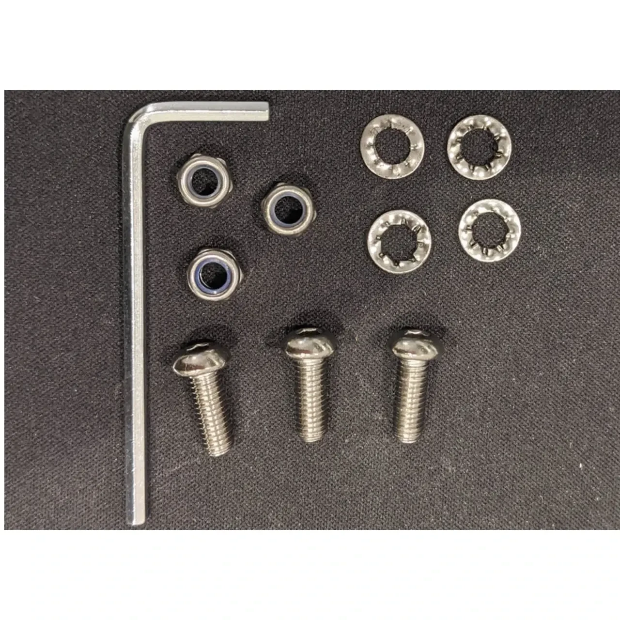 VooDoo Motorcycle Components Voodoo Sidewinder Turn Down Tip, motorcycle exhaust hardware kit with screws, washers, allen key, and mounting rings.