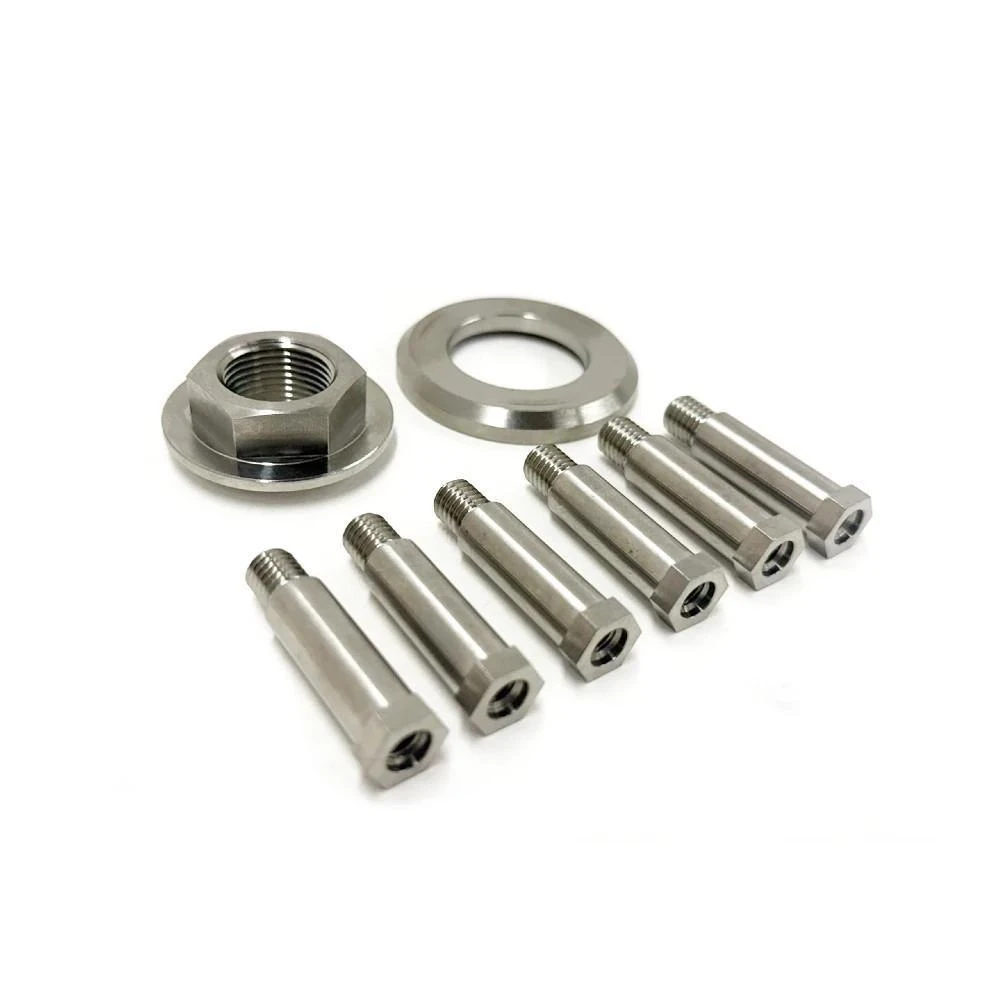 Ironless Innovations Motorcycle Parts Titanium Clutch Mod And Hardware Kit Kawasaki ZX10R (06-25), image showing titanium clutch hardware components including bolts, a nut, and a washer.