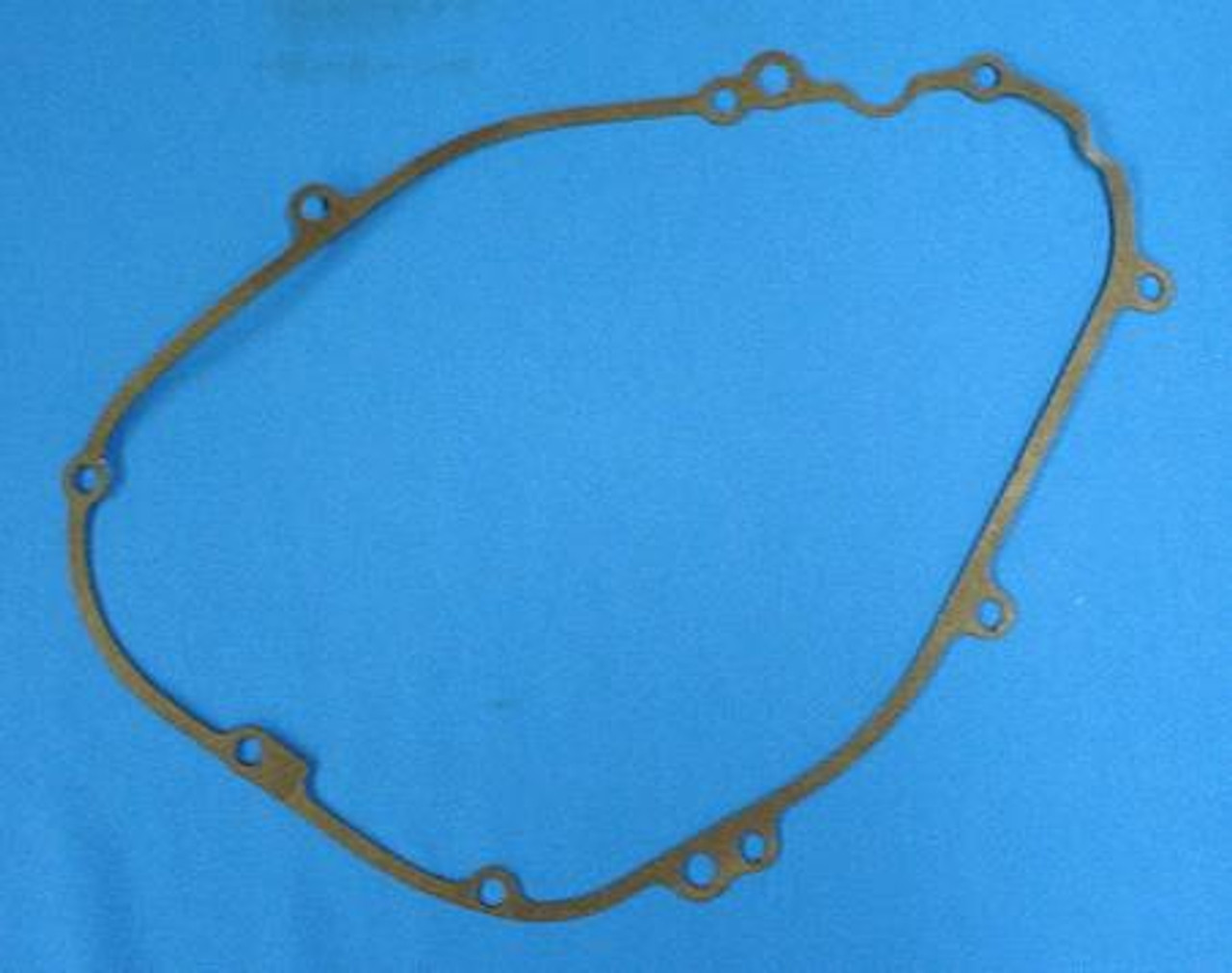 Cometic Inner Dyno Cover Gasket Kawasaki KLR650 (96-20), motorcycle engine gasket against a blue background.