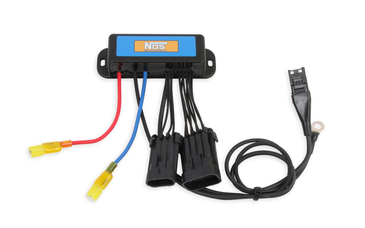 NOS 2 Stage Mini Nitrous Controller, compact electronic device with wiring and connectors for controlling nitrous oxide flow in performance vehicles. NOS 2 Stage Mini Nitrous Controller, compact electronic device with wiring and connectors for controlling nitrous oxide flow in performance vehicles.