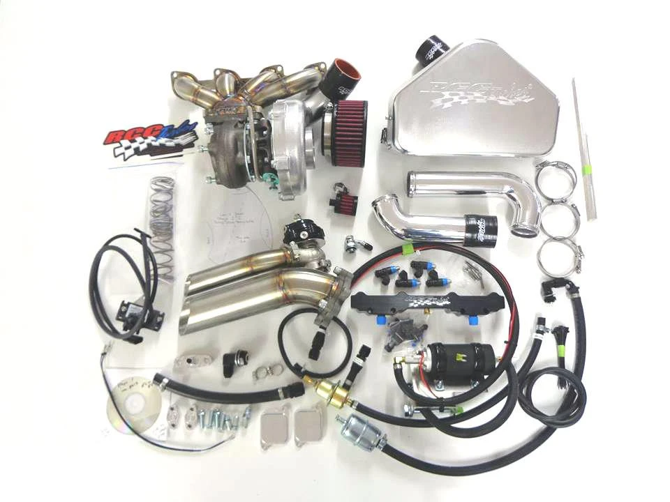 RCC Turbo Kit Stage 2 Suzuki Hayabusa (08-20), high-performance turbocharged motorcycle engine parts and components displayed on a white surface.