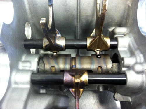 Suzuki OEM Shift Drum for Suzuki Hayabusa (99-20), engine part with shift forks and shafts inside engine casing.
