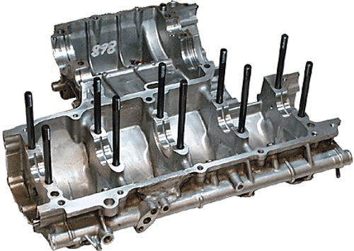 APE Main Bearing Studs Suzuki Late GS1150, a set of engine main bearing studs installed in a metal engine block. Loading Image