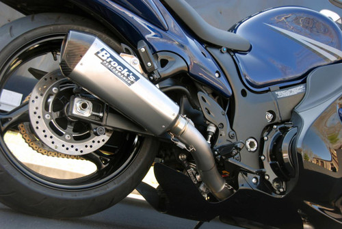 Brocks Performance Brocks CT Full Exhaust 16" Muffler Suzuki GSX1300R Hayabusa (08-20), close-up view of the motorcycle's exhaust system showcasing the metallic muffler and rear wheel.