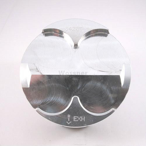 Wossner Piston Kit Honda CBR1000RR (04-15), high-performance motorcycle piston with a sleek metallic finish and precise machining for optimal engine performance. Wossner Piston Kit Honda CBR1000RR (04-15), high-performance motorcycle piston with a sleek metallic finish and precise machining for optimal engine performance.
