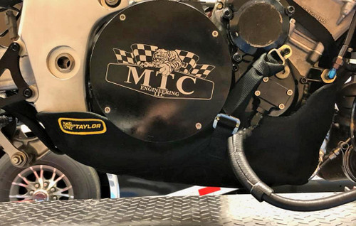 DME Taylor Lower Engine Restraint | Engine Diaper, black protective cover on motorcycle engine with MTC Engineering LLC logo and Taylor branding.