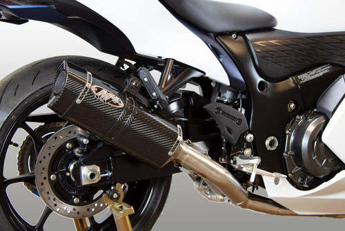 M4 Performance Exhausts M4 Tech1 Carbon Exhaust Suzuki Hayabusa (22-25), close-up view of the sleek carbon fiber motorcycle exhaust pipe attached to a Suzuki Hayabusa motorcycle.