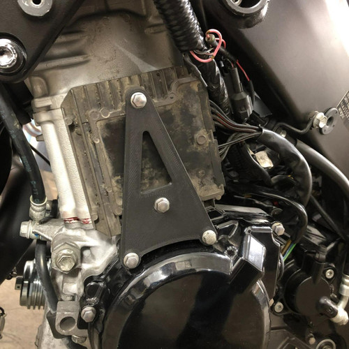 Ryan Schnitz Racing RSR Rectifier/Regulator Relocation Bracket, Suzuki Hayabusa (99-26), installed on motorcycle engine to reposition the rectifier/regulator for optimal clearance and cooling.