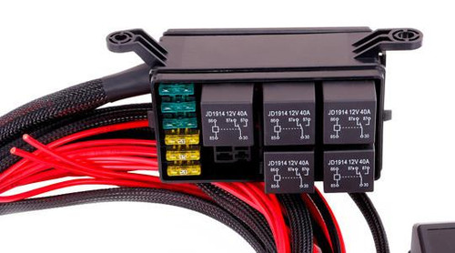 MaxxECU Relay and Fuse Box - Schnitz Racing, automotive electrical relay and fuse box with multiple relays and red and black wiring cables.
