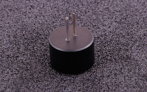 MaxxECU CMC 1.5 Terminal Removal Tool, small black cylindrical tool with metal prongs on top used for removing terminals.