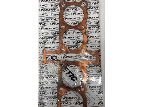 Cometic Head Gasket Yamaha FJ1100/1200, copper head gasket with multiple circular cutouts and bolt holes on a branded background. Cometic Head Gasket Yamaha FJ1100/1200, copper head gasket with multiple circular cutouts and bolt holes on a branded background.