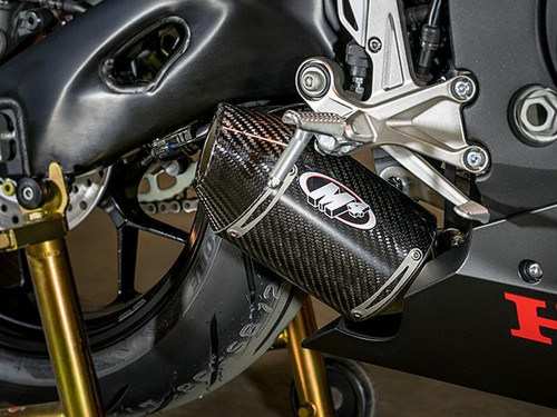 M4 Performance Exhausts M4 Street Slayer Carbon Slip On Exhaust for Honda CBR1000RR (17-23), close-up of the stylish black carbon fiber exhaust with M4 logo on a sport motorcycle.