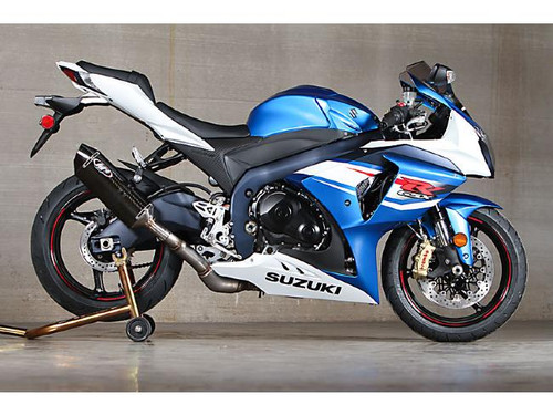 M4 Performance Exhausts M4 Carbon Fiber Slip On Suzuki GSXR1000 (12-16), motorcycle with blue and white body and carbon fiber exhaust system.