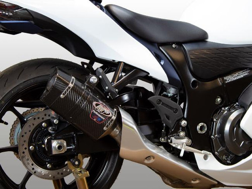 M4 Performance Exhausts M4 Dual Carbon Fiber Tech 1 Slip On Suzuki Hayabusa (22-25), close-up view of the motorcycle's rear section showing the carbon fiber exhaust and rear wheel.
