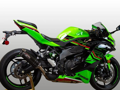 M4 Performance Exhausts M4 X-96 Carbon Fiber Slip On Exhaust Kawasaki ZX-4RR (23-25), a vibrant green Kawasaki ZX-4RR motorcycle with M4 X-96 carbon fiber slip-on exhaust installed for enhanced performance.