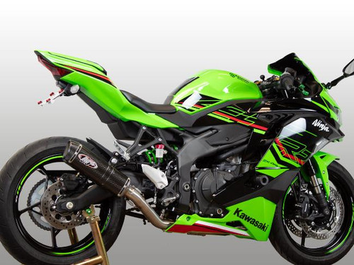 M4 Performance Exhausts M4 X-96 Carbon Fiber Full Exhaust Kawasaki ZX-4RR (23-25), green and black sport motorcycle with carbon fiber exhaust, featuring sleek design and performance-oriented components.