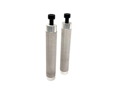 Schnitz Racing Footpegs, pair of metal footpegs with textured grip surface and black mounting screws.