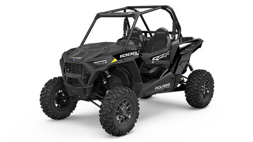 APE Adjustable Cam Sprockets Polaris RZR1000PS / XP / EPS (14-23), off-road utility vehicle with rugged tires and black body, designed for enhanced performance.