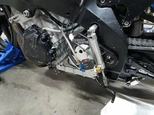 Robinson Industries Output Shaft Support Kit Suzuki GSXR1000 (05-08), installed on the motorcycle's engine, showing the shaft support and related components for stability and performance enhancement.