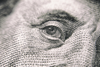 close-up of a 20-dollar bill and Benjamin Franklin's face
