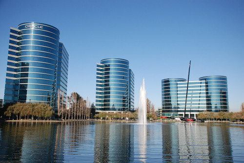 office buildings surround body of water 