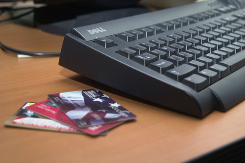 keyboard with credit cards on side