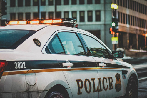 police car in a city police car in a city