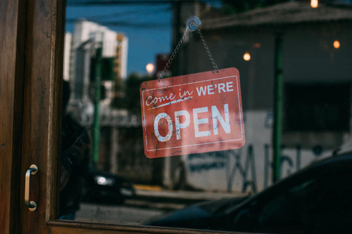 open sign on a store window