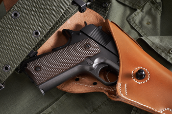 1911 Holsters: Leather vs. Kydex 