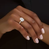3 1/5 CTW Oval Lab Created Diamond  High Set Hidden Halo Solitaire with Accents Engagement Ring in 14K White Gold (MD250409)