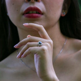 Round Black Diamond Bezel Set Round Halo Engagement Ring in White Gold with Accents (MVSB0038-W)