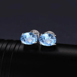 1 9/10 CTW Oval Blue Topaz 4-Prong Stud Earrings in 0.925 White Sterling Silver (MDS170117)