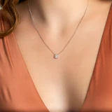 1/4 CTW Round Diamond Oval Halo Necklace in 18K White Gold (MDR220014)