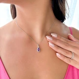 1 1/7 CTW Pear Purple Amethyst & Round Diamond Infinity Halo Pendant Necklace in 14K White Gold (MDR220144)