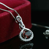 1 CTW Oval Red Garnet Infinity Pendant Necklace in 0.925 White Sterling Silver With Chain (MDS170224)