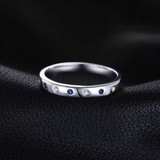 1/10 CTW Round Blue Nano Sapphire Semi-Eternity Ring in 0.925 White Sterling Silver (MDS210160)