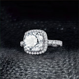 4 1/5 CTW Cushion White Cubic Zirconia Cushion Halo Cocktail Ring in 0.925 White Sterling Silver with Accents (MDS230010)